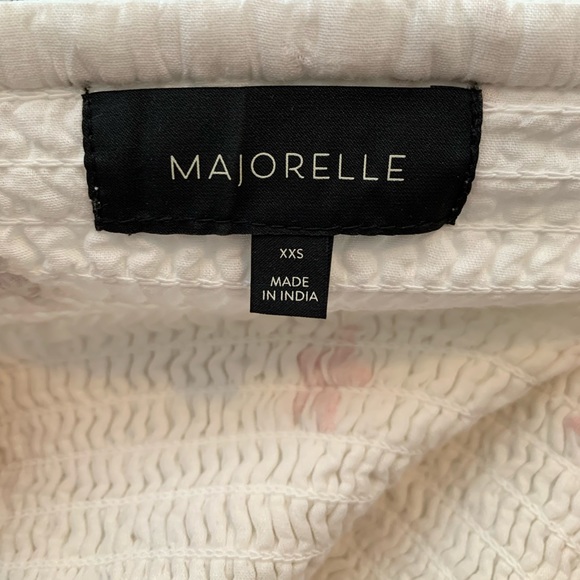 White dress with red & blue stars. Front cutout and side zipper. Fits like xs/s - Picture 6 of 7